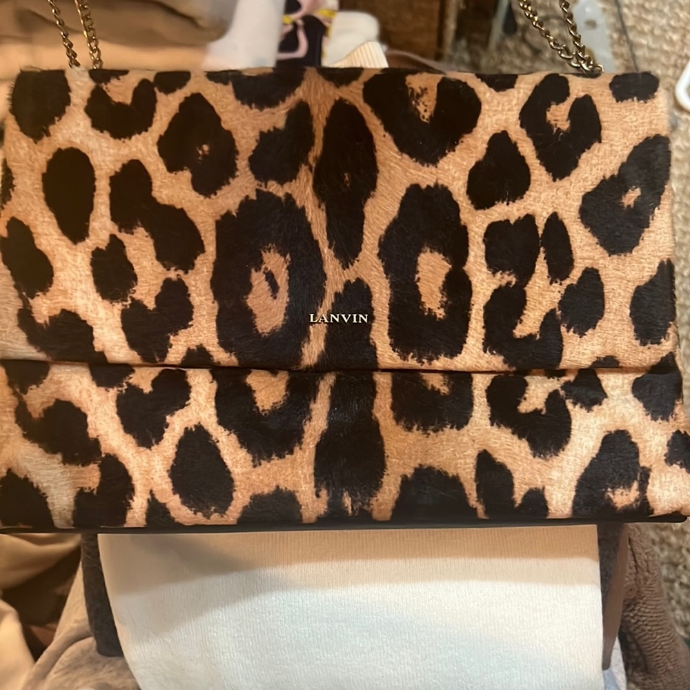 Lab in calf hair leopard shoulder bag. Worn a hand full of times.